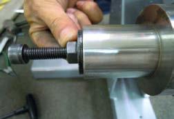 13) Mount the other tool from Figure H behind the bearing cap portion