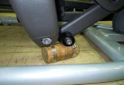 6) Remove the bolt that holds the link arm to the pedal arm and remove the pedal arm (Figure F).