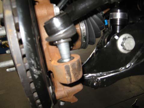 Unbolt the OE brake line, ABS line and brackets from the side of the knuckle. Save the hardware for reinstallation.