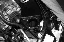 Secure the air filter to the bottom of the flange with the supplied #56 hose clamp located in the fender well. (See Fig 9-c.) D.