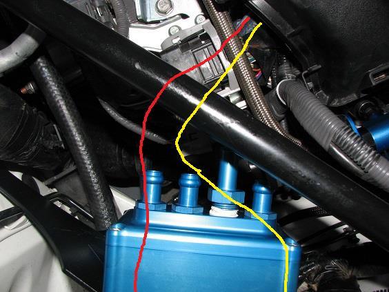 32) In the below photo, you can see how the hoses are routed under most of the connectors and harnesses.