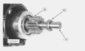 Separate motor housing (23) from shift lever housing (17) and armature (30). 11.