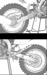 SWINGARM/SHOCK LINKAGE Raise the rear wheel off the ground by placing a work stand or equivalent under the engine.