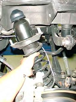 12) Before you remove the spring, you will need to mark the orientation of