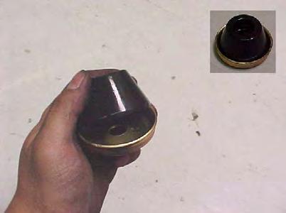 Once attached, place the new bushing