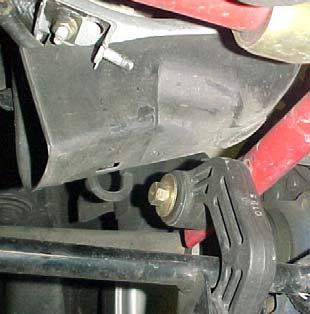 Use a 10mm wrench or socket to remove the retaining nut