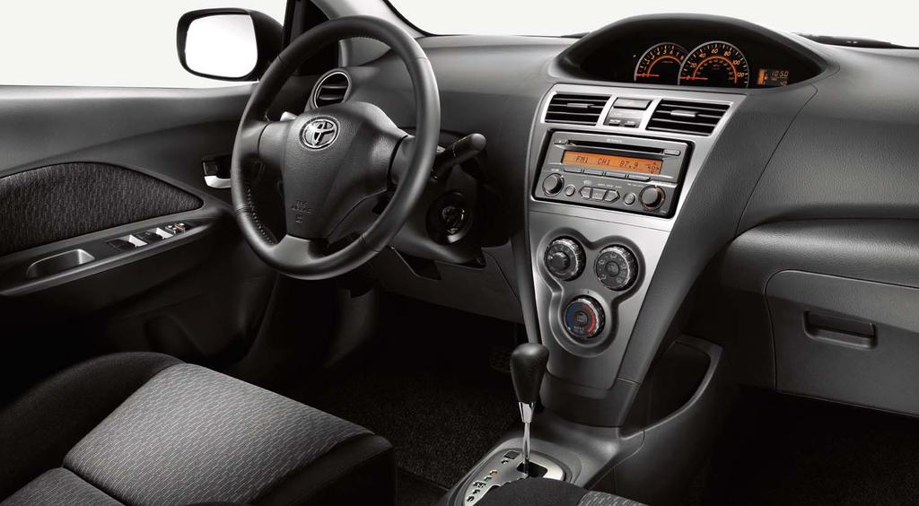 Sedan interior shown in Dark Charcoal with available Sport Package and available 4-speed automatic transmission.