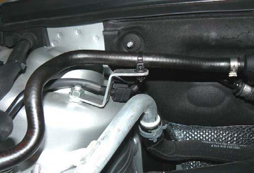 as shown in Figure 14. Secure the fuel line with the cable tie and trim as necessary.