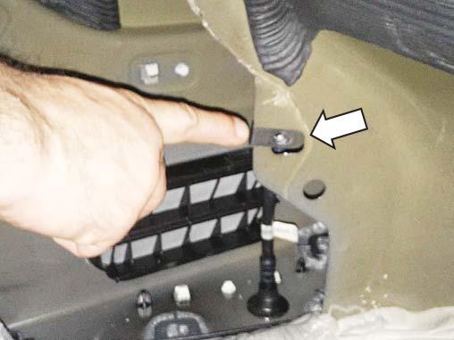 driver side sheet metal in the trunk as shown below.