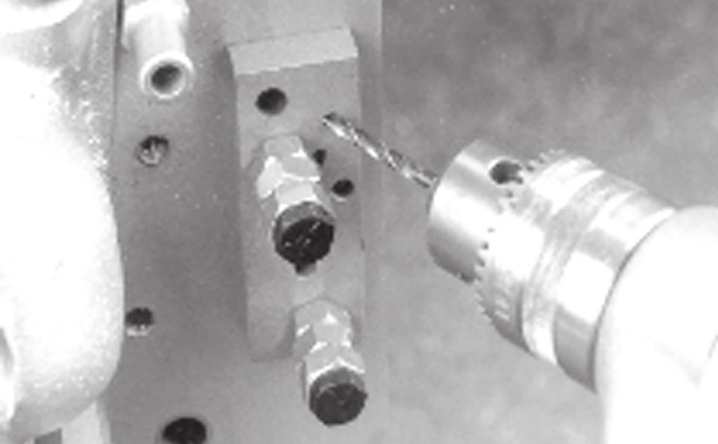 3. Crankcase Modification - 1970-1980 Only. Drill Pressure Valve Relief Hole.