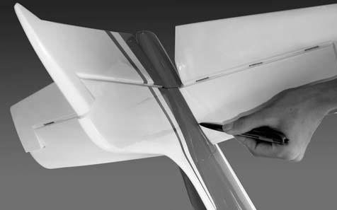 Using a triangle, check to ensure that the vertical stabilizer is aligned 90 degree to the horizontal stabilizer. 7.
