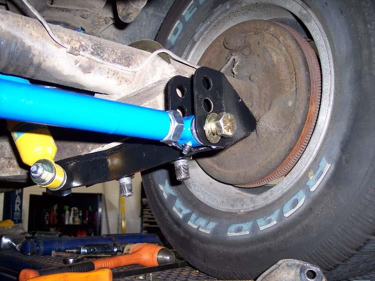 Choose the holes that allow the bar to be as low and as level as possible based on your ride height.