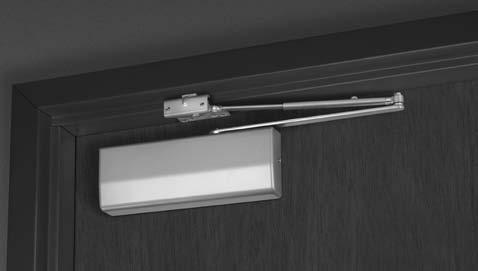 Closer is mounted on the pull side, with the arm almost perpendicular to the face of the door.
