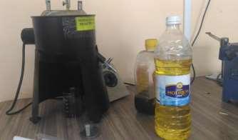 Step 2: Transesterification to form TMP ester Methyl ester of Cottonseed oil (1200 ml) and TMP (300g) were added to the glass reactor.