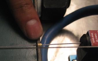 wire in the position described above, crimp the