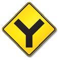 Section 2: Signals, Signs and Pavement Markings Intersections: An intersection is ahead. Be alert for vehicles entering the road on which you are traveling.