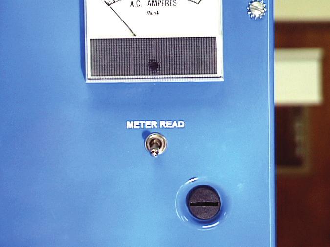 6. With the motor running at zero load, turn on and hold the Meter Read Switch on the Motor control Unit, as shown in figure 64.