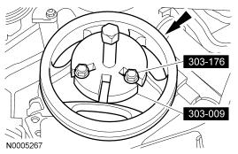 5. Position a safety stand under the RH side of the subframe. 6. Remove the bolts and lower the RH side of the subframe 50.8 mm (2 in). 7. Remove the crankshaft pulley bolt and washer. 8.