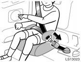 LS13023 1. Sit the child on a booster seat.