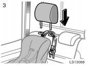 Installation with child restraint lower anchorages (regular cab models) LS13068 3. Fix the child restraint system with the seat belt and tighten the top strap. Replace the head restraint.
