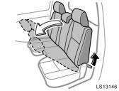 Folding seatback (bench seat only) LS13153 BEFORE FOLDING SEATBACK Make sure the center seat belt is removed from the guide when folding seatback.