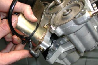 INTO THE CRANKCASE OIL O-RING TO MAKE EASIER INSTALLATION.