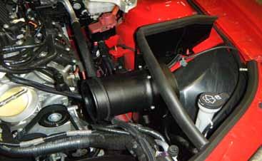 The adapter hose should be installed on the end between the air box assembly and duct with the larger