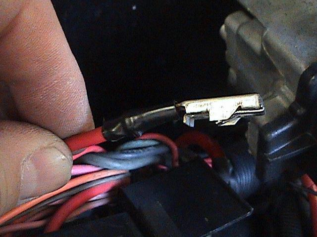 Install the new red wire from the harness with the red shrink into the fuse holder in place of the wire you just removed. 14.