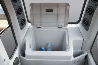 Holder An Additional storage box and cup holder are located