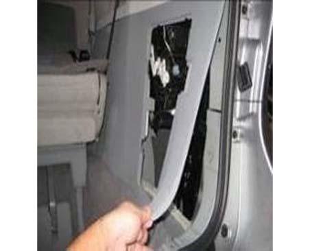 Trim panel removal tool (o) Use a trim panel removal tool to pry the passenger s side rear panel partially away from the vehicle (Fig. 2-12). Fig. 2-12 3. Disassemble the Vehicle (Exterior).
