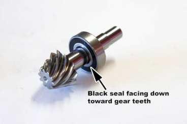 bearing driver. Note, be careful not to damage seal or nick chrome fork plating with hammer. Use plastic faced hammer.