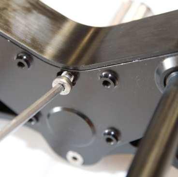 Bottom Triple Clamp Disassembly Note: To service the triple clamp chains, sprockets and bearings it is recommended that you