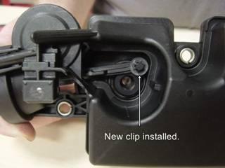 #42 You can now put the vacuum pot actuator lever back over the pin of the new bell crank lever and push the new retaining clip on. Use a socket or other similar tool to push the clip onto the pin.