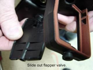 #21 Once the steel pin has been removed, the flapper valve can be slid out of the DISA housing frame work.