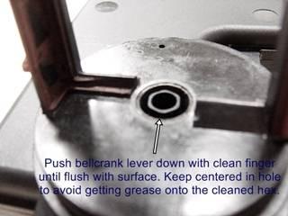 with a clean cloth and solvent. Use brake cleaner, acetone, or similar solvent.