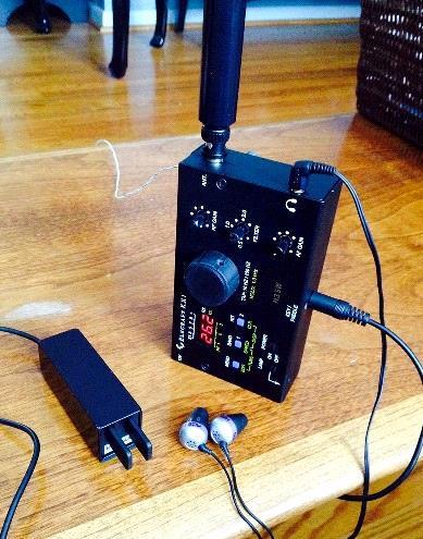 The complete Elecraft KX1 HT weighs-in at 1.5lbs! If you take two antennas for 20m and 30m, the total weight is 1.75lbs. I have had great results operating with this CW HT.
