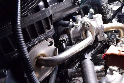 It does not matter which hose goes to which port on the AOS. Cut the hoses to length and install on the barbed fitting.