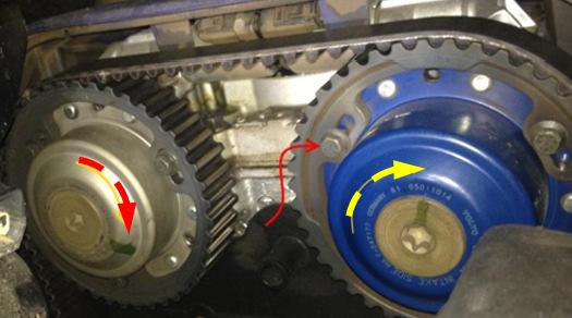 19) Using the lever on the tensioner, you can remove the belt without a lot of trouble by pushing the top tab lever FORWARD. It is normally recommended to replace the tensioner with the timing belt.