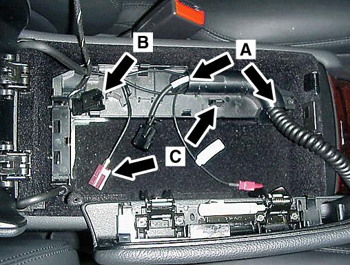 9. 10. 11. Route the coil-cord power and FAKRA connectors through the tube on the compartment floor (A, Figure 16).