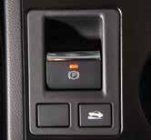 While Operating Electronic Parking Brake To apply, depress the brake pedal and pull up the parking brake switch.