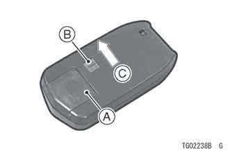 the emergency key by pulling out it with sliding the knob to the arrow mark. Be sure to insert the emergency key into fob when using the normal use.