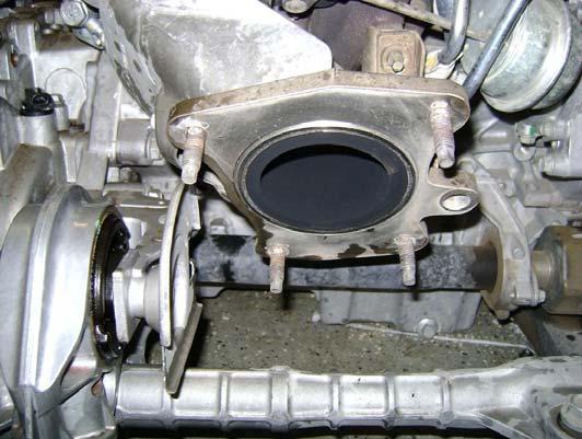 Remove the intake ducting from the turbo.