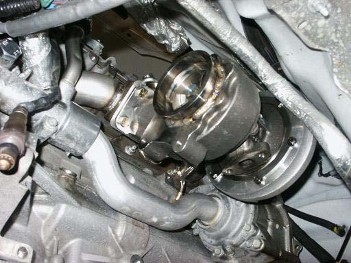 Install the new exhaust manifold to the head.