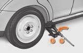 Pre-tighten the anti-theft bolt using the wheelbrace 1 fi tted with the antitheft socket 5.