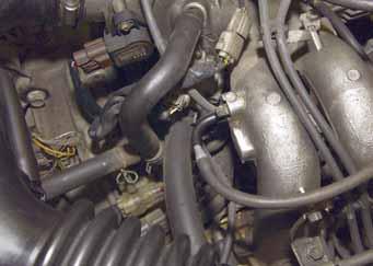 Find a reliable vacuum source located after the throttle plate (manifold vacuum). This port is after the throttle plate, but it s located on a single intake manifold runner.