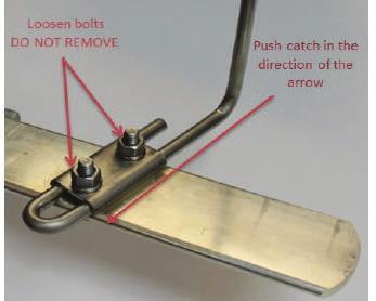 Do not remove the bolts completely. See Figure 15. 7. Insert the gauge (supplied) as shown in Figure 16 (the width of the gauge is 1.68"). 8.
