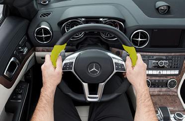 HANDLING THE WHEEL One of the worst driving habits we see is the tendency to steer with one hand on top of the wheel and the other hand resting on the gear lever.