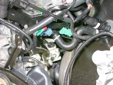 .8l gasoline Disconnect hose from engine outlet to heat exchanger inlet with