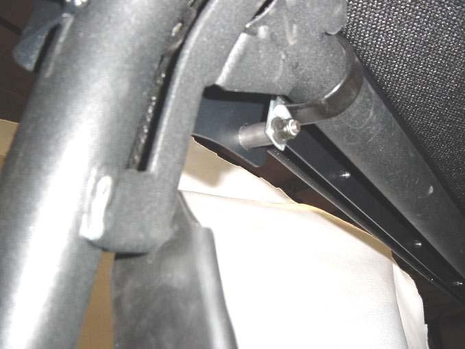 (rear corners), through the P- clamp, a small, standard, steel washer, and a locknut. 3.