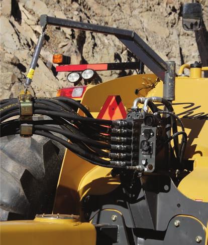 Attachments Lower the costs of Challenger Tractors in scraper applications.